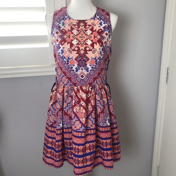 Xhilaration Dresses & Skirts - NWT Xhilaration size M bold print & lace up side